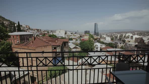 View of Old Part Tbilisi City, Georgia, with Roofs of Old and Modern Buildings, Glass Skyscraper