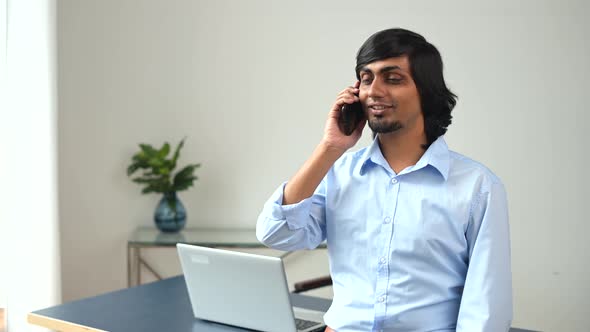 Smiling Indian Man Ceo Male Employee in Formal Wear Stands in Bright Office Space