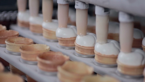 Automatic Modern Equipment At Work During Ice-cream Production. Food Factory Conveyor. alt