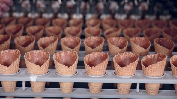 Modern Equipment At The Food Factory. Automatic Conveyer, Production Line Of Ice-cream Cones. alt