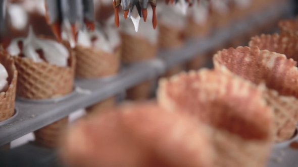 Modern Equipment At The Food Factory. Automatic Conveyer, Production Line Of Ice-cream Cones. alt