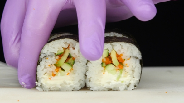 Master Cut Rolls And Lays Them On The Surface.  alt