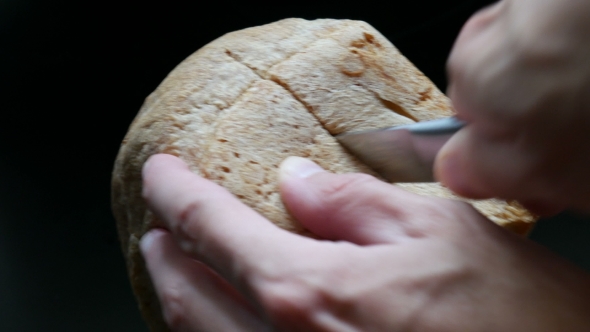 Cutting a Slice Of Bread