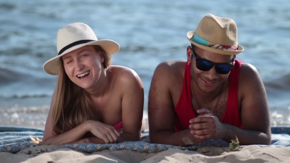 Attractive Couple Having Fun on the Beach alt