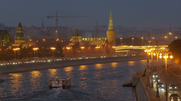 View Of Moscow River In Twilight Time Along Embankment With Pleasure Craft, Car Traffic