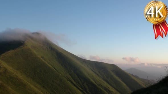 Clouds Over Mountain Range alt