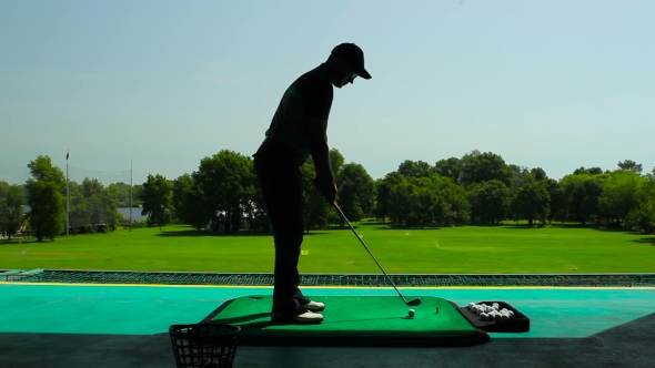 Young Man Playing Golf In The Shadow, Stock Footage | VideoHive