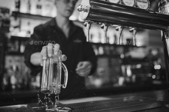 Barman at work in the pub Stock Photo by arthurhidden | PhotoDune
