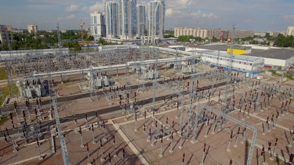 Aerial View Of Electrical Power Substation against the background of a big city