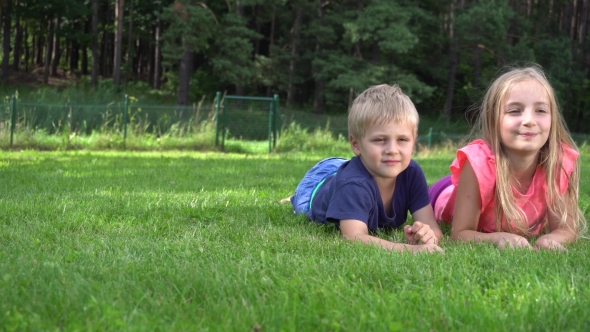 Children Playing On The Grass