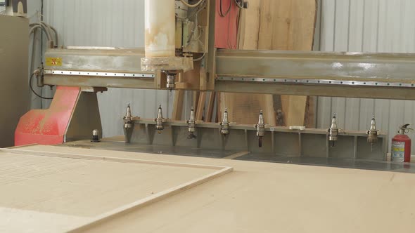Woodworking Shop and a Machine for Processing Wooden Blanks Closeup