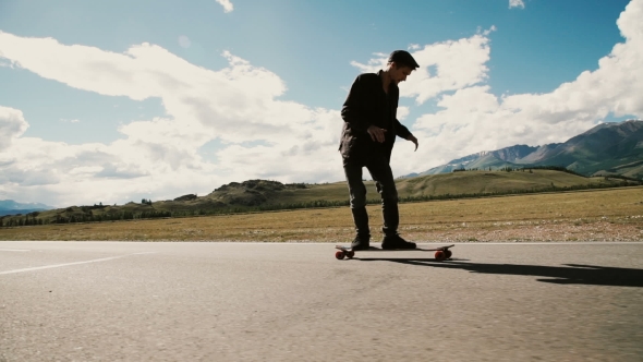 Skateboarder Riding Down Hill At Sunset, Stock Footage | VideoHive