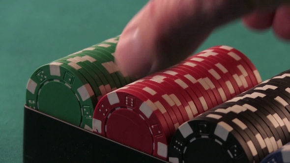 Red Poker Chips Taken Out Of The Box