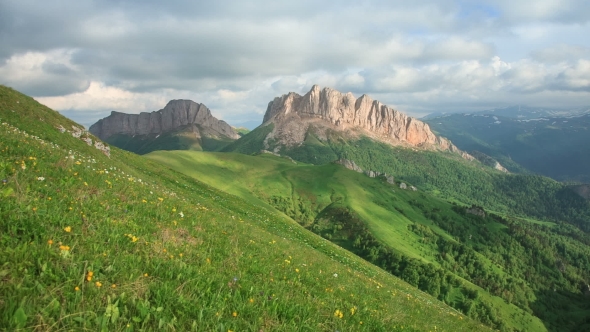 Mountains (Eastern And Western Acheshbok) Under a Blue Sky With Clouds alt