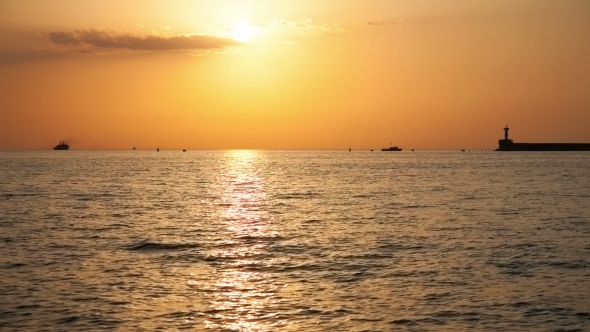 Boats Floating On The Sea At Sunset alt