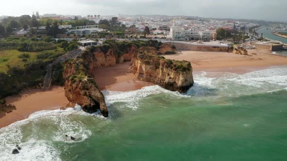 Sensational Aerial Drone View of Paradisiac Lagos Coast Beach Landscape in Algarve Portugal Flying alt