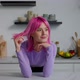 Portrait of Dreamy Lovely Pink Haired Young Woman Smiling in Kitchen - VideoHive Item for Sale