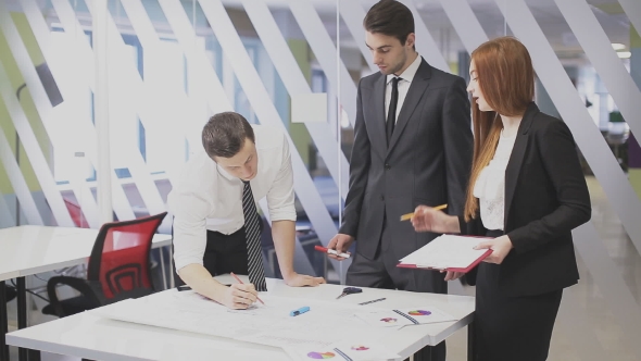 Office Workers Discussing a Project