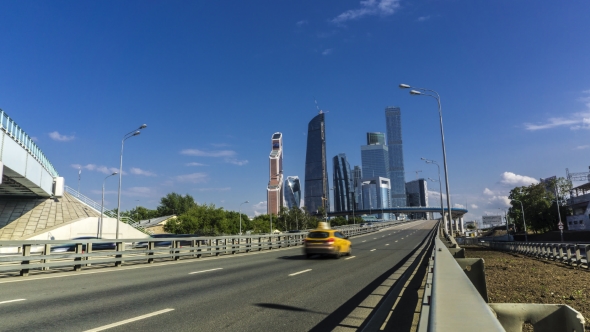 Skyscrapers Of Moscow City Business District And Watering Machines   alt