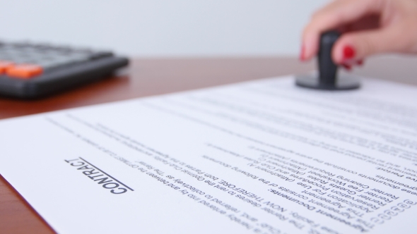 People Puts The Seal On The Document.  alt