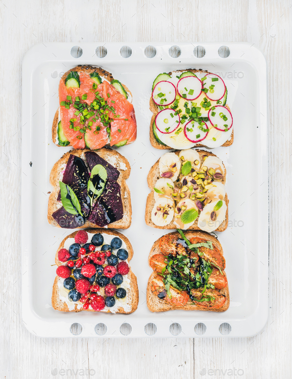 Sweet and savory breakfast toasts assortment - Stock Photo - Images