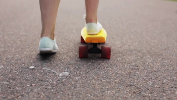 Teenage Girl Feet Riding Short Modern Skateboard alt