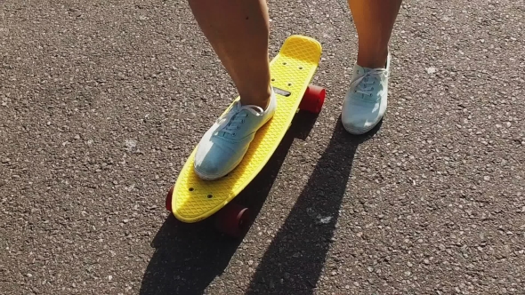 Teenage Girl Feet Riding Short Modern Skateboard alt