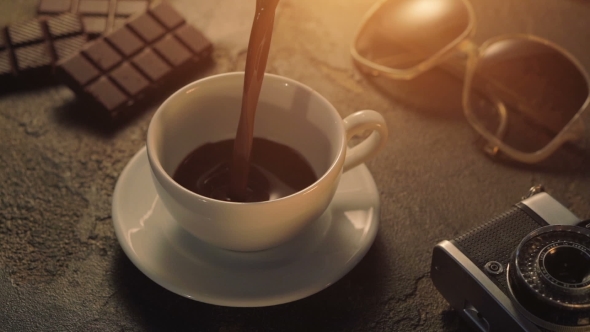 Cup Of Hot Chocolate With Retro Camera And Sunglasses alt