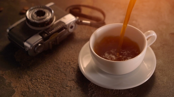Vintage Film Look: Cup Of Coffee With Retro Camera
