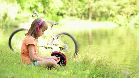 Little Girl At Lakeside