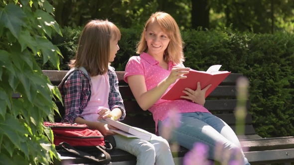 Mother And Daughter Reading Books