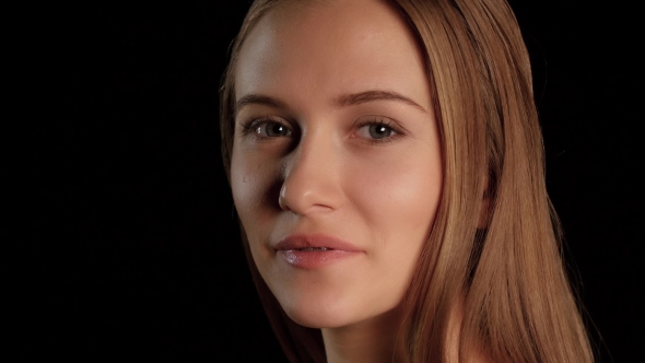 Girl With Braces And Blue Eyes alt