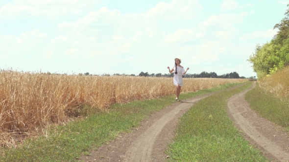 Woman In a White Dress Runs Across The Road