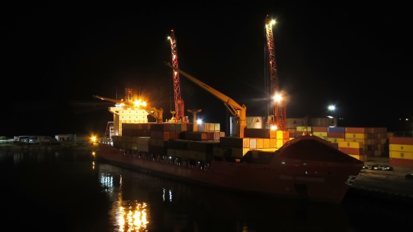 Unloading Cargo From a Ship In The Sea Port Of Batumi By Night. , Stock ...