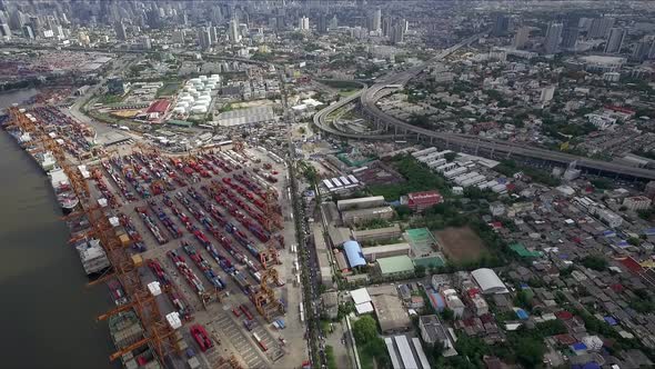 Logistic concept aerial shot of commercial maritime transport dockyard with cargo ships waiting to b alt