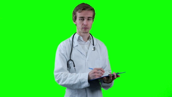 Doctor In a White Coat Writes a Prescription. Chroma Key Background. alt