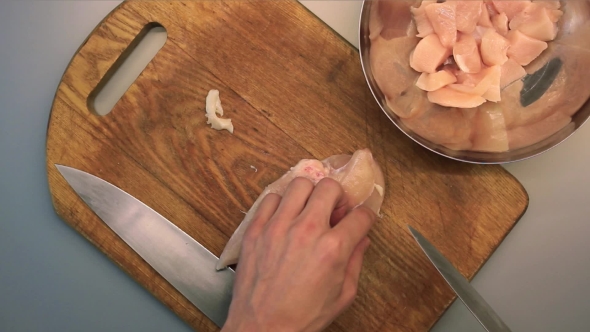 Male Hands Filet Chicken
