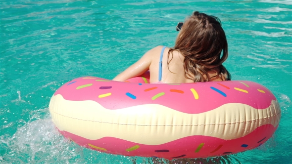 Sexy Woman In Bikini Enjoying Summer Sun And Tanning During Holidays In Pool With Cocktail alt
