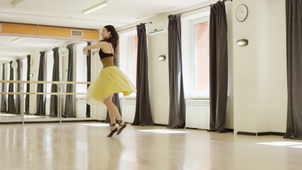 Girl Wearing Costume With Corset Is Dancing  alt