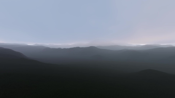 Flying Over The Hills In Fog