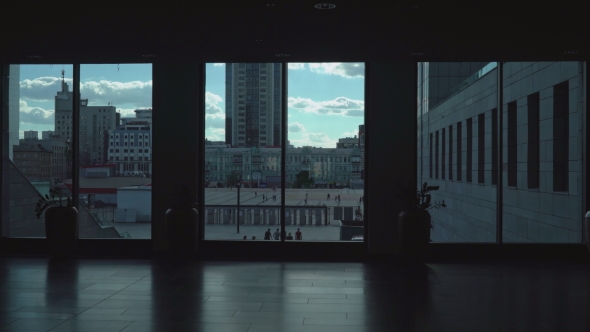 Type a Dark Corridor Of High Windows, Which Go Passersby. alt