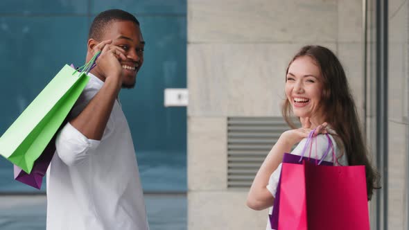 Closeup Back View Multiracial Couple Multiethnic Family African Man and Caucasian Woman Carry alt