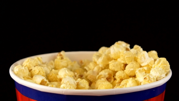 Hands Grabbing Popcorn On Black, Rotation alt