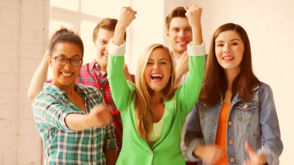 Students In School With Expression Of Triumph alt