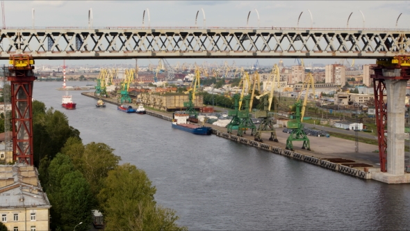 The ships are on the sea canal at the port of Saint-Petersburg