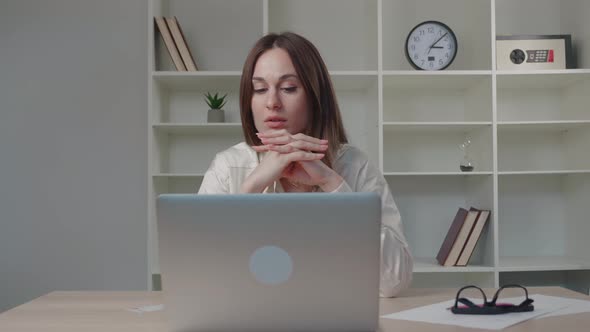Head Shot Close Up Stressed Young Woman Looking at Laptop Thinking of Personal or Work Problems alt