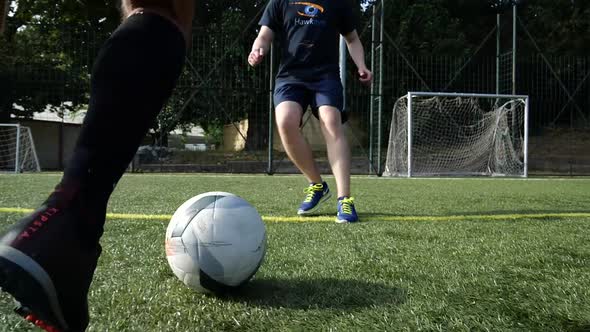 Soccer player passes opponent