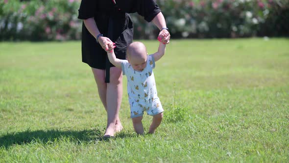 Baby's First Steps on the Grass