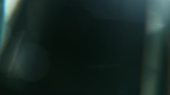 Super Slow Motion Shot of Diamond Light Reflection Isolated on Black Background at 1000Fps alt