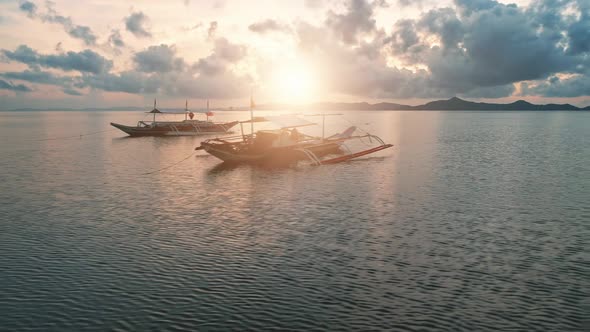 Aerial Bright Dawn Over Filipino Boat Water alt